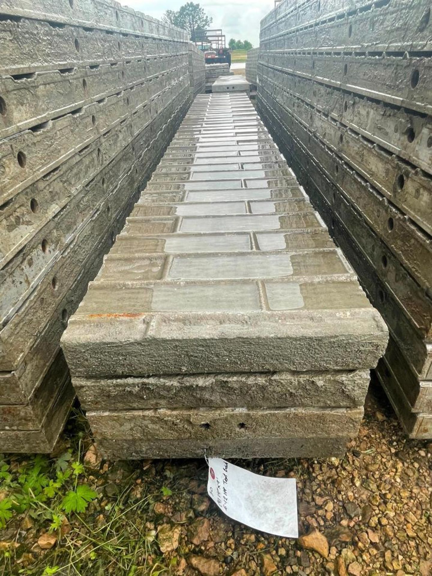 (4) 14" x 9' Wall-Ties Textured Brick Aluminum Concrete Forms 6-12 Hole Pattern. Located in Lake Cry