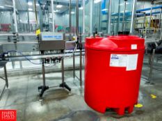 Volumex Chemical Pump with Air Operated Valve and Plastic Tank Rigging Fee: $ 2500