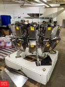 2011 Ishida 14 Head Scale, Model: RS-214W-15/30, S/N 56099Location:Blawnox, PA Rigging Fee: $ 200