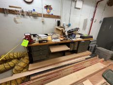 WORKSHOP COUNTERTOP, WOODEN TABLE MOUNTED ON METAL FRAME, VICE MOUNTED, INCLUDES A VARIETY OF