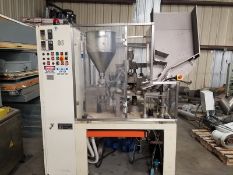 Comadis B18 piston tube filler, 10 head, serial # 2-C65, volt 220, 3-phase,  tube orientor (