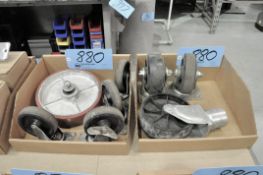 Lot-Various Caster Wheels in (4) Boxes with (2) Large Casters and Hose Under (1) Bench