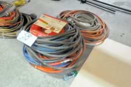 Lot-Various Hoses on Floor Under Bench