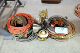 Lot-Extension Cords and Lights on Floor Under Bench