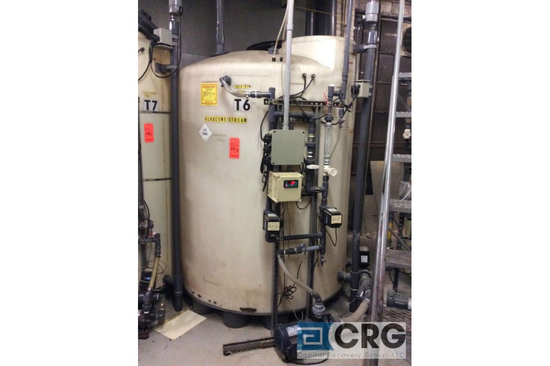 Approx 1000 gallon alkaline treatment poly storage tank (LOCATED ON 1ST FLOOR CHEMICAL MIXING)