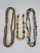 Agate and green stone necklace, amber-type necklace and another (3)  Condition ReportPlease see
