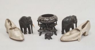 Pair early 20th century lady's satin shoes, ebony elephants and elephant bowl and stand