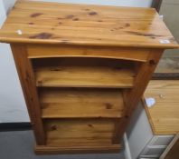 Modern pine open bookcase on plinth base, 66 x 109cm