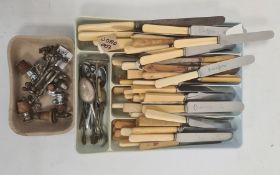 Quantity of flatware including ivory-type handled knives, spoons, bottle stopper and a quantity of