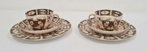 Two pairs Royal Crown Derby china cups, saucers and tea plate, all Imari decorated