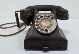 Black bakelite telephone, no.5088(?) and numbered 312F.P.X54/3A