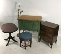 Modern pine side table with three assorted drawers, on turned supports, a mahogany coffee table, a