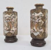 Pair of Japanese Satsuma vases of hexagonal panelled form, each decorated with a panel of seated