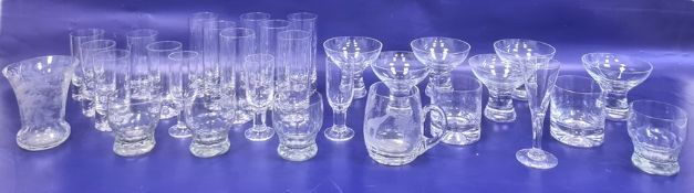 Etched mug decorated with giraffe, various cut tumblers, water glasses and sundae dishes