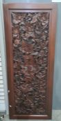 Modern eastern carved panel featuring birds amongst foliage