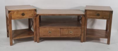 Suite of modern lounge furniture to include rectangular coffee table, two side tables, nest of three