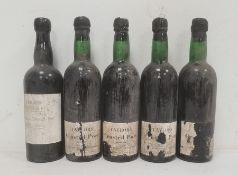 Three bottles of 1964 Taylor's Crusted Port, another bottle of probably same (label torn) and a