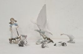 Lladro figure of young girl with three kittens, Lladro model of dove on flower, 28cm high approx and
