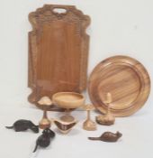 Light stained wood turned shallow bowl, Eastern carved tray, carved wooden animals and other treen