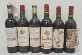Two bottles of 1979 Chateau les Templiers Lalande de Pomerol, a bottle of 1974 Chateau Montrose L