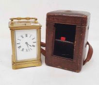 Brass and glass carriage clock with Roman numerals to the dial, in carry case  Condition