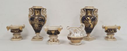 Set of three early 19th century Derby pastille burners, each circular, decorated in royal blue and