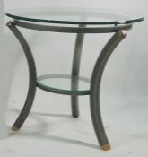 Circular coffee table with glass top, on metal base, in the Egyptian taste, 59cm diameter