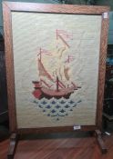 20th century oak-framed needlework firescreen