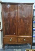 Early 20th century mahogany wardrobe, the cavetto cornice above two doors and two drawers, on square