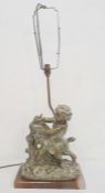 Modern brass and onyx table lamp in the form of putto with goat, 54cm high