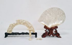 Chinese carved shell, intricately pierced and carved with ducks on a pond surrounded by flowers