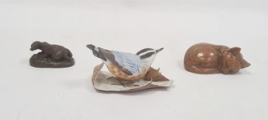 Brooks and Bentley bisque china model bird with leaves, carved wooden model cat and a bronze