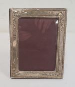 Late 20th century rectangular silver-mounted picture frame, frame with repousse decoration,