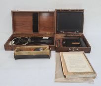 Ellams duplicator in stained wood case, a vintage metal surveyors tool in stained wood box and a