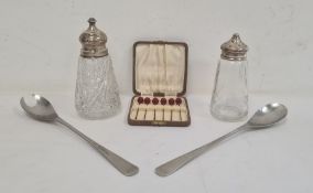 Two silver-mounted lidded and glass sifters, a cased set of silver and red beaded cocktail sticks,