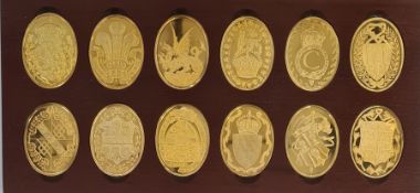 Stunning collection of twelve solid sterling ingots plated with 22carat gold as a commemorative of
