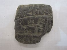 Small cuneiform pottery accounts tablet, circa 200BC, with accompanying written inscription 'Small
