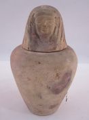 Egyptian painted terracotta canopic jar with lid, representing one of the sons of Horus, circa 1st