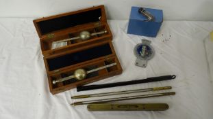 Marine hydrometer marked Dobbie McInnes Ltd, Glasgow Greenock, in case, a further marine hydrometer,