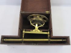 Brass theodolite by J Liford London, in wooden fitted case together with a tripod stand in