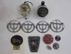 Jaeger car clock, circa 1950, cream face with dark red numbers, chrome borders, a Cooper Stewart