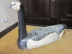 Large painted wood carving of a Barnacle goose  73 cms h. x 107 lenth cms The hand-painted goose was
