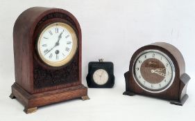 20th century oak arch topped mantel clock with roman numerals to the enamel dial, further 20th
