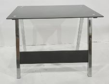 Rectangular glass topped desk on chromed support, 100cm wide