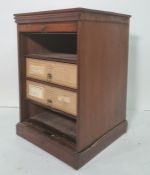 20th century mahogany table-top chest with sliding tambour front, opening to reveal shelves and