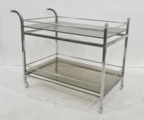 Two-tier tea trolley with smoked glass shelves and chromed body