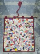 Small modern rug, diamond pattern in creams, salmons and blues, 107 x 67cm together with a