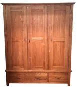 Pair of modern oak three-door wardrobes on bases with two drawers (2)  Condition ReportYes the