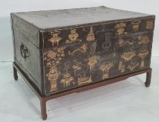 Chinese gilt decorated and lacquered leather trunk on stand, 19th century and later, 83cm x 54cm (ex