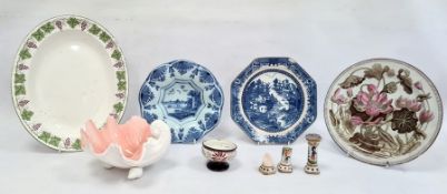 Delft shallow dish painted with riverside building, pair Quimper pottery knife rests (damaged),